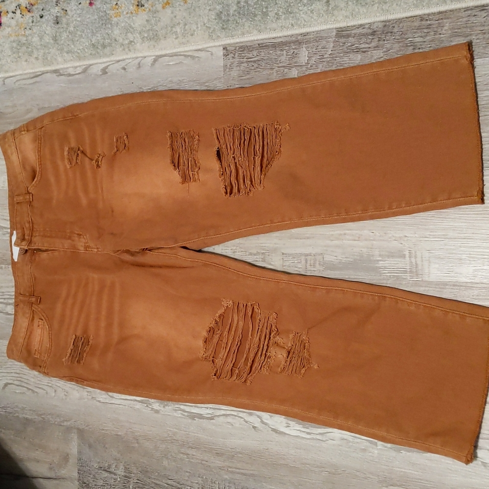 Brown distressed jeans. Brand new without tags!